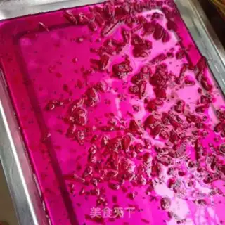 Make Flaming Dragon Jell-O, little circle bumping on milk step 7