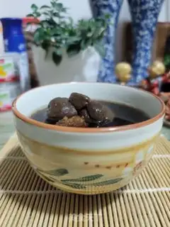 Make Black garlic pigbone soup step 6
