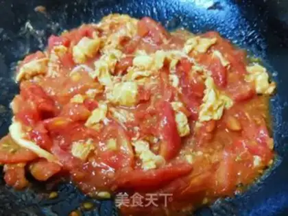 Make Tomato fried eggs step 9