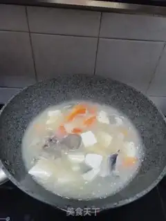 Make Fish-bone papaya tofu soup step 7