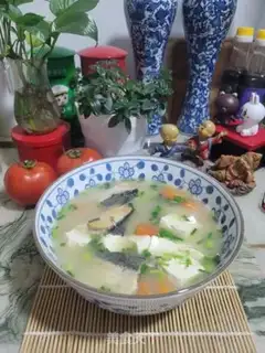 Make Fish-bone papaya tofu soup step 10