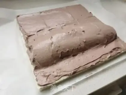 Make An angel cocoa cream roll step 8