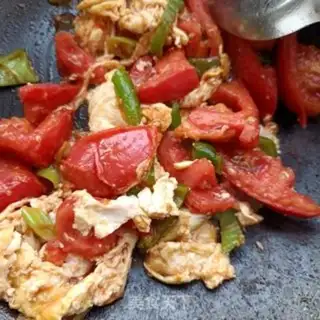Make Cream tomato fried goose eggs step 18