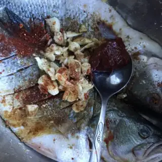 Make Spicy roasted bass step 3