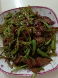 Make Five flowers with green pepper step 5