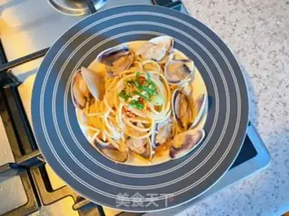 Make White clams boil pasta step 10