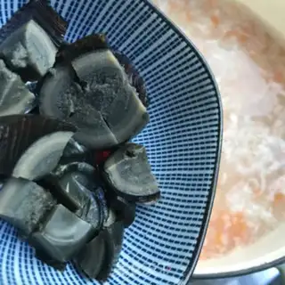 Make Shrimp egg and vegetable congee step 7