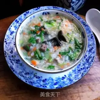 Make Beef leather egg congee step 10