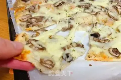 Make Seafood mushroom pizza step 14