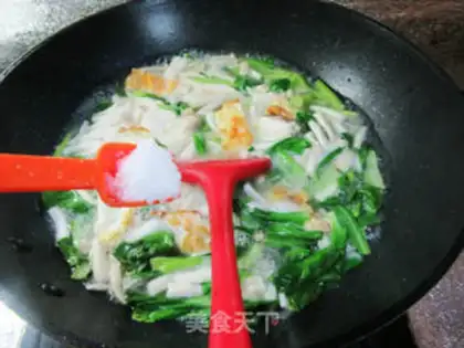 Make Cream seafood mushrooms fried egg tofu soup step 7