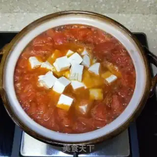 Make Tomato eggs and tofu step 7