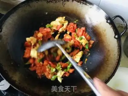 Make Eggs and tomatoes step 3