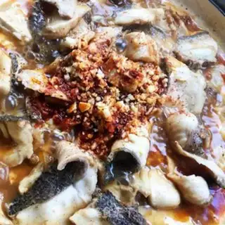 Make Spicy black fish tofu step 11