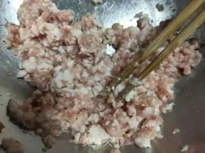 Make Pork abalone carrot dumplings step 11