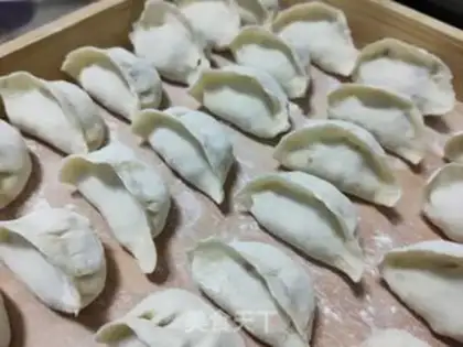 Make Pork abalone carrot dumplings step 16