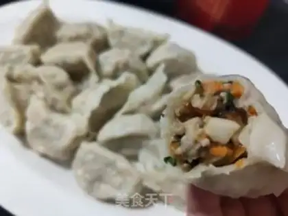 Make Pork abalone carrot dumplings step 17