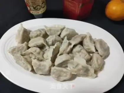 Make Pork abalone carrot dumplings step 18