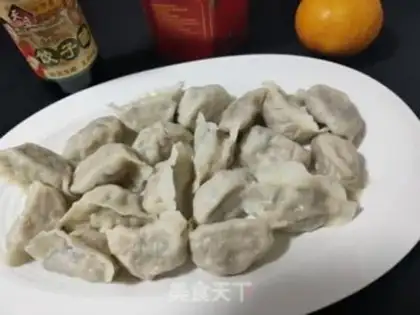 Make Pork abalone carrot dumplings step 19