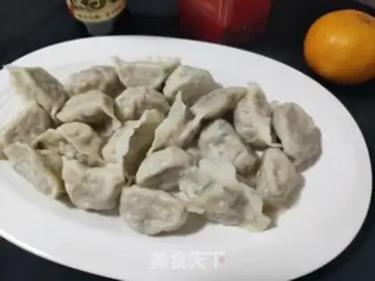Make Pork abalone carrot dumplings step 20