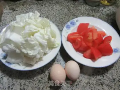 Make Eggs and tomatoes and cabbage step 0