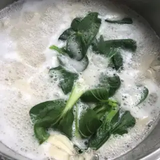 Make Garlic tomato egg noodles step 11