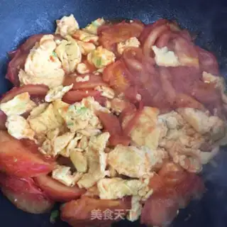 Make Tomato fried eggs step 7