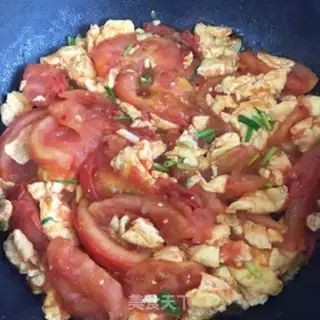 Make Tomato fried eggs step 8