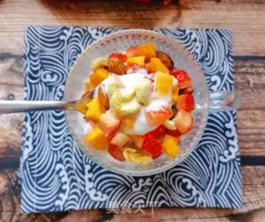 Make Mango strawberry nuts and yogurt step 9