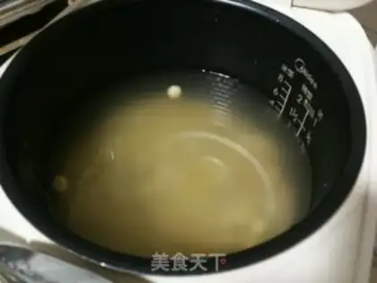 Make Pumpkin Lotus 2m porridge step 1