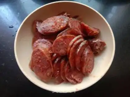 Make Garlic sprouts and spicy sausages step 2