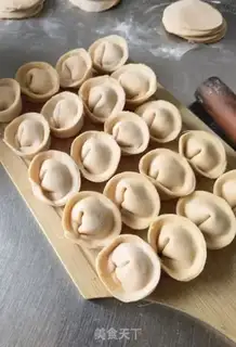 Make Yuanbao dumplings step 22