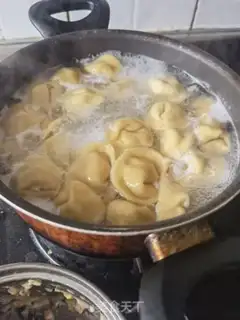 Make Yuanbao dumplings step 25