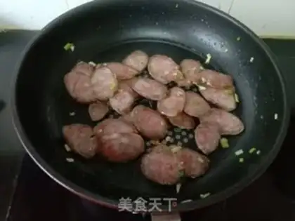 Make Corn green bean fried sausage step 2