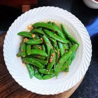 Make Garlic sweet peas step 4