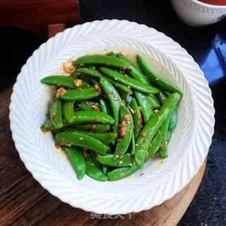 Make Garlic sweet peas step 5