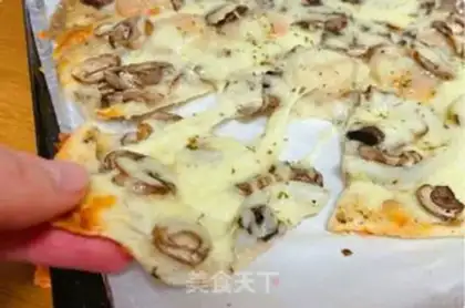 Make Seafood mushroom pizza step 7