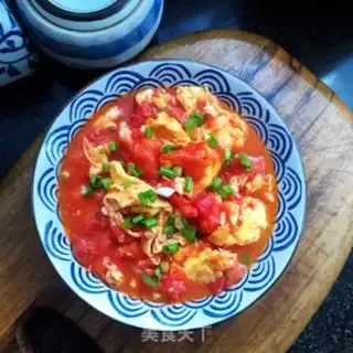 Make Tomato fried eggs step 8
