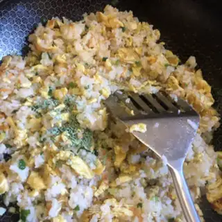Make Onion egg fried rice step 11