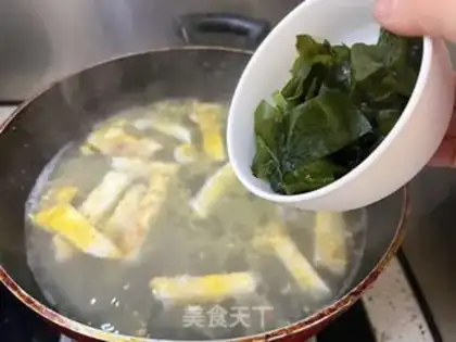 Make Clothes and tofu soup step 7