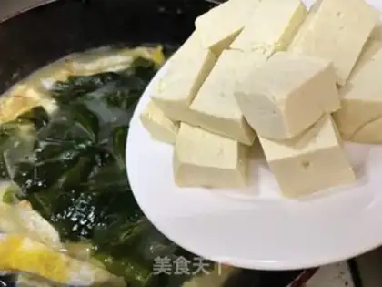 Make Clothes and tofu soup step 8