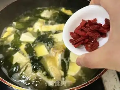 Make Clothes and tofu soup step 10