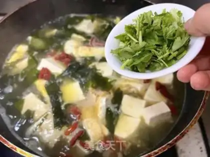 Make Clothes and tofu soup step 11