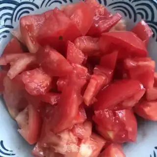 Make Tomato fried eggs step 2
