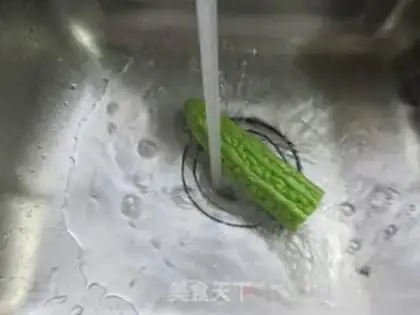 Make Squeeze the tofu and make the bitter melon step 2