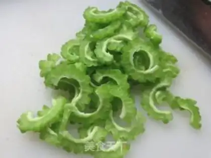 Make Squeeze the tofu and make the bitter melon step 3