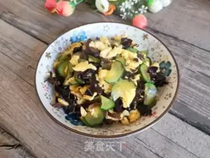 Make Black cucumber fried eggs step 9