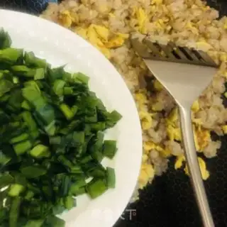 Make Cream egg fried rice step 10