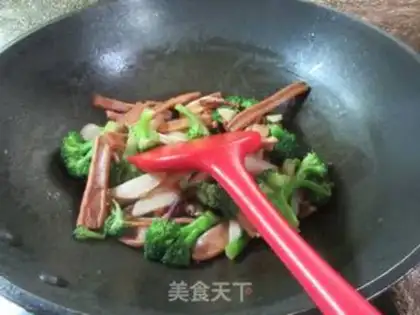 Make The white squid fire the broccoli step 10