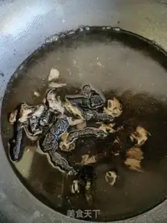 Make Black chicken claws with red oil step 3