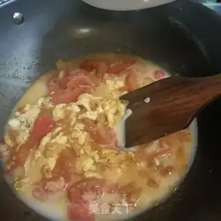 Make Tomato fried eggs step 10